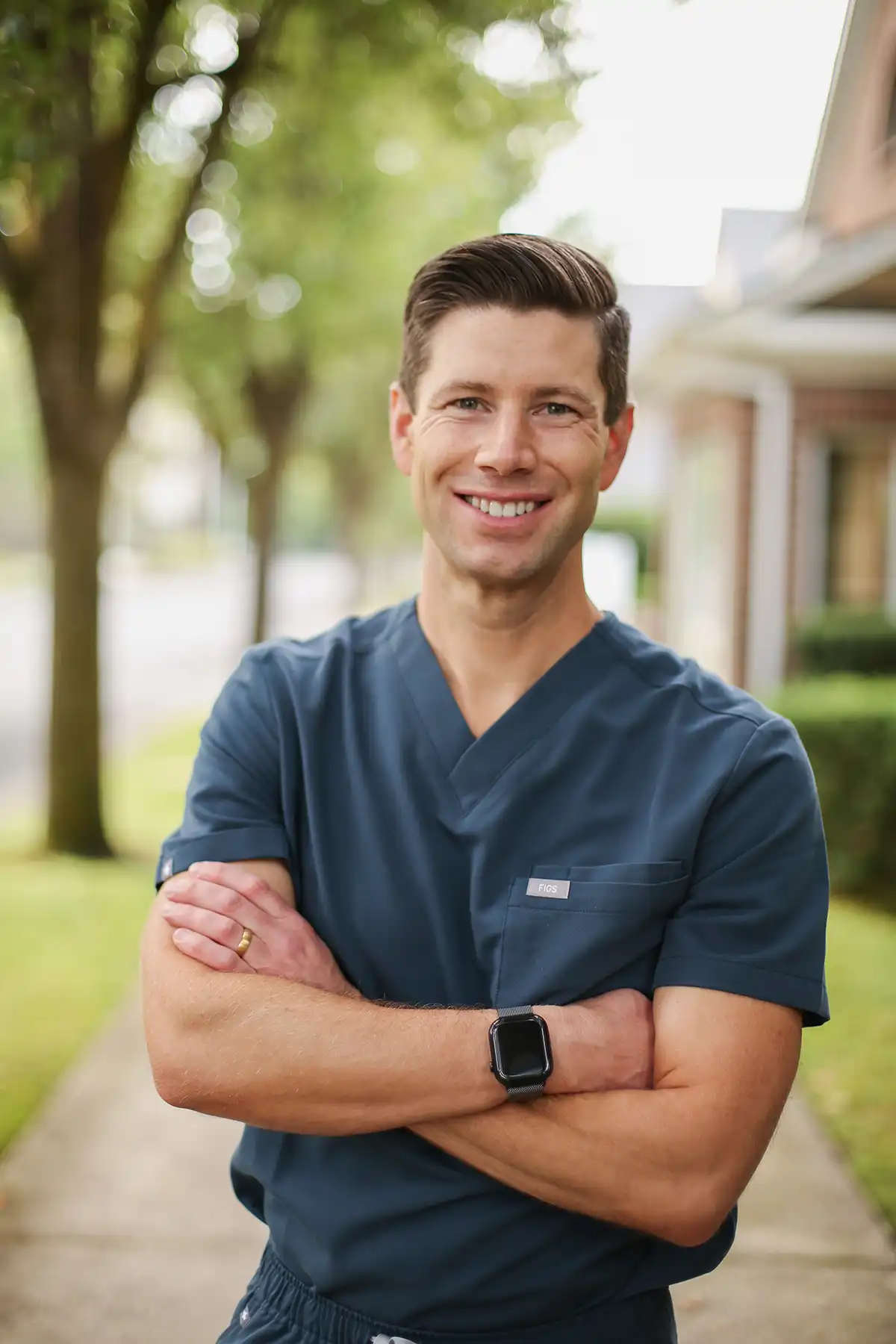 Portrait of Dr. Jesse Hayden smiling outdoors, dentist at Hayden Dental Care in Tigard, OR.