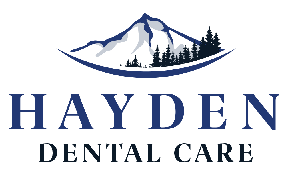 Hayden Dental Care logo featuring a mountain design and text. The logo represents the branding of Hayden Dental Care.