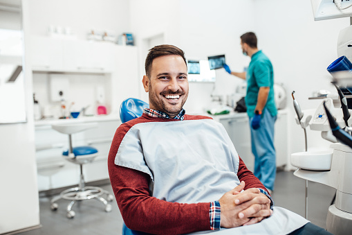 Patient relaxing comfortably in a dental chair during a dental appointment. Hayden Dental Care focuses on gentle and comfortable dental treatments for every patient.